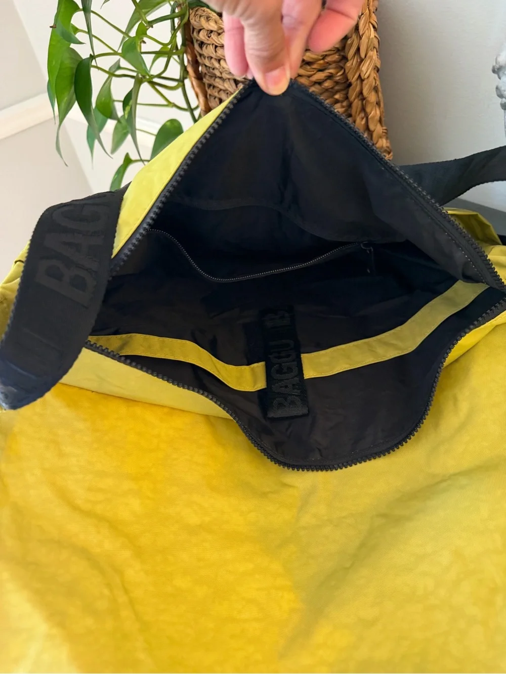 BAGGU nylon Messenger bag in bright chartreuse/yellow-green color known as Lemon